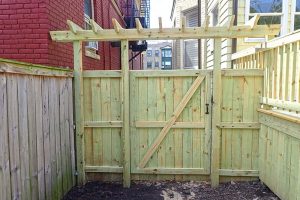 Custom fence design with torii top in Norfolk